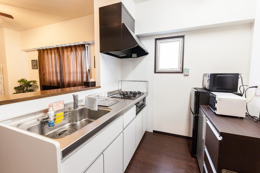 Anjuur Appartement Okinawa Buitenkant foto
